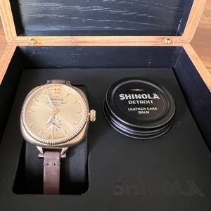 Women’s Brown and Gold colored Shinola Watch.